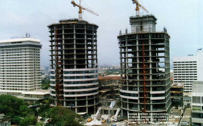 Colombo world trade center under construction both the towers with few floors constructed. Viewed from the South West year 1994.